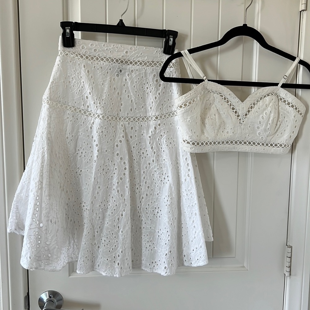 A beautiful 2 piece set Small. The top is a bra top and a high-low skirt.